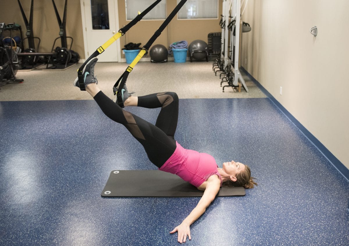 Supine pendulum swing with TRX Suspension Trainer